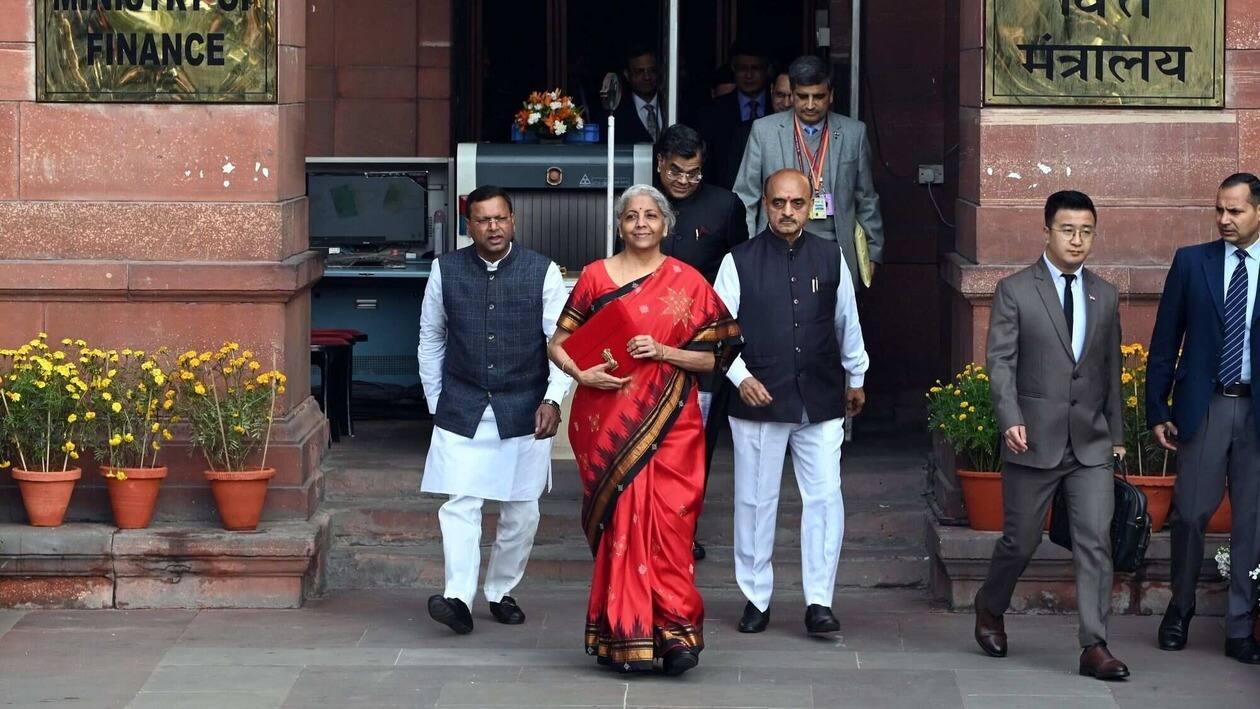 Nirmala Sitharaman, India's finance minister, center, and other members of the finance ministry leave the ministry to present the budget at the parliament in New Delhi, India, on Wednesday, Feb. 1, 2023. Sitharaman�will announce the last full-year budget before Prime Minister Narendra Modi seeks a third term in elections due in the summer of 2024. Photographer: Prakash Singh/Bloomberg