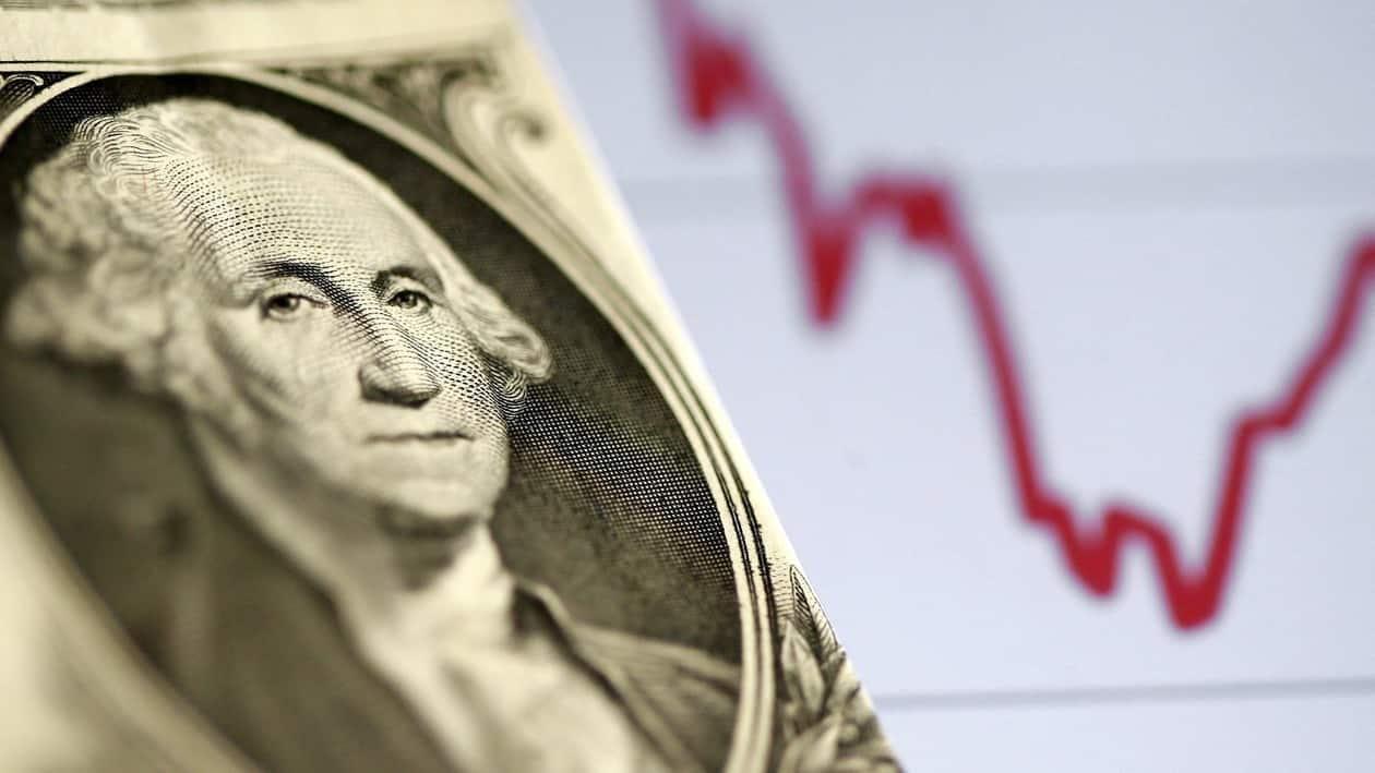 FILE PHOTO: A U.S. dollar note is seen in front of a stock graph in this November 7, 2016 picture illustration. Picture taken November 7. REUTERS/Dado Ruvic/Illustration/File Photo