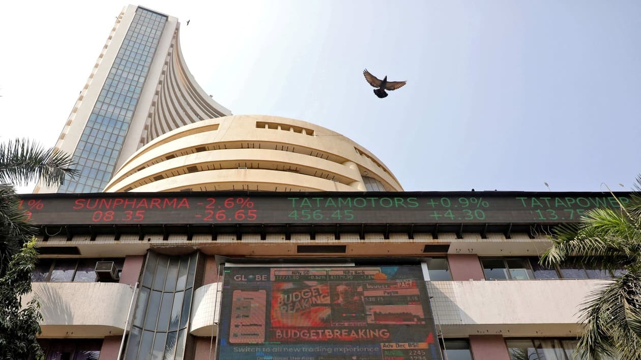 A bird flies past a screen displaying the Sensex results on the facade of the Bombay Stock Exchange (BSE) building in Mumbai, February 1, 2023. REUTERS/Niharika Kulkarni
