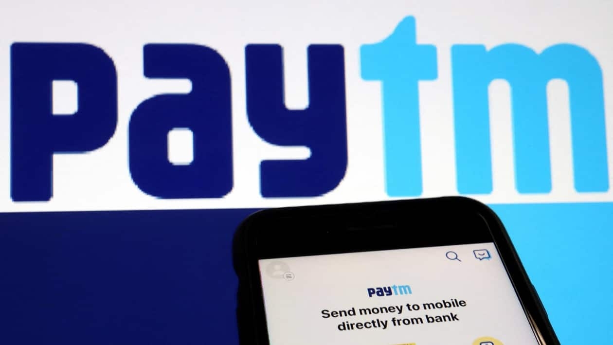 FILE PHOTO: The interface of Indian payments app Paytm is seen in front of its logo displayed in this illustration picture taken July 7, 2021. REUTERS/Florence Lo/Illustration/File Photo