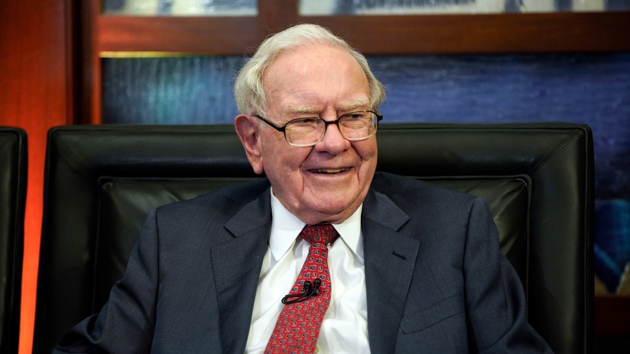 FILE - Berkshire Hathaway Chairman and CEO Warren Buffett smiles during an interview in Omaha, Neb., May 7, 2018. Buffett said critics of stock buybacks are “either an economic illiterate or a silver-tongued demagogue” or both and all investors benefit from them as long as they are made at the right prices. Buffett used part of his annual letter to Berkshire Hathaway shareholders Saturday, Feb. 25, 2023 to tout the benefits of repurchases that fiery Wall Street critics like Sens. Elizabeth Warren and Bernie Sanders and many other Democrats love to criticize.  (AP Photo/Nati Harnik, File)
