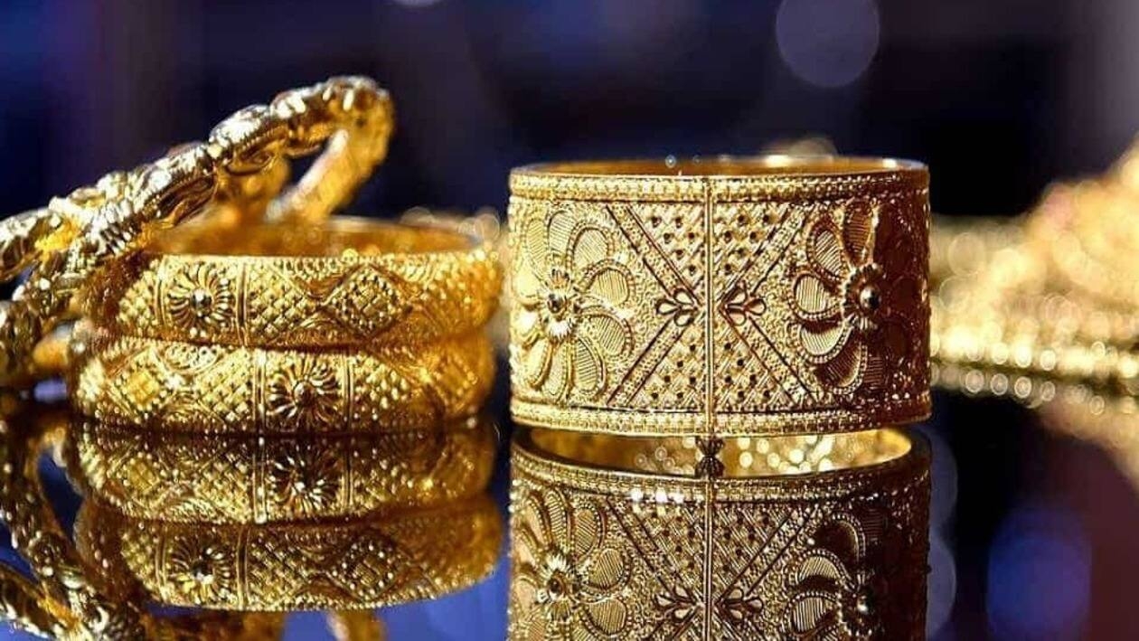 In the overseas markets, gold was quoting lower at USD 1,891 per ounce and silver was flat at USD 21.61 per ounce.