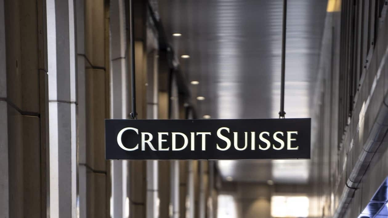 A sign hangs outside a Credit Suisse Group AG bank branch in Geneva, Switzerland, on Monday, July 25, 2022. Credit Suisse report 2Q earnings on July 27. Photographer: Jose Cendon/Bloomberg
