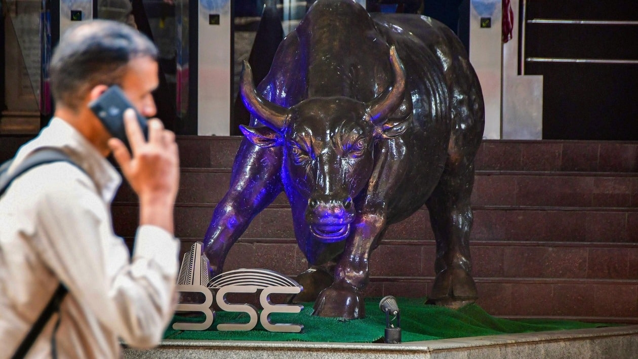 Mumbai: A pedestrian walks past the Bombay Stock Exchange (BSE) building, in Mumbai, Friday, Jan. 27, 2023. Equity benchmarks Sensex and Nifty plunged over 1 per cent for a second straight session on Friday, Jan. 27, 2023. (PTI Photo)(PTI01_27_2023_000237A)