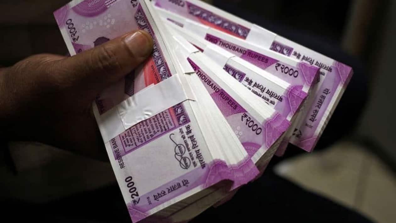 Approximately  <span class='webrupee'>₹</span>1 lakh crore is destined deposits in bank. REUTERS/Mukesh Gupta