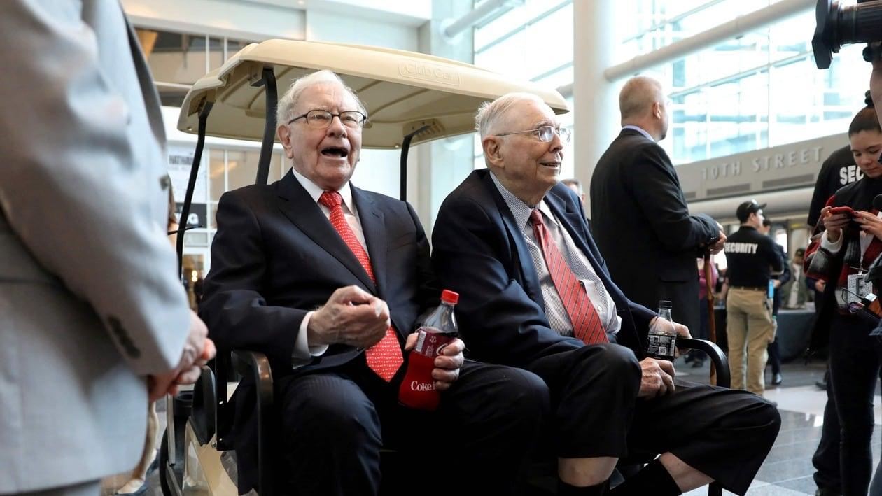  Charlie Munger (right) is the vice chairman of Berkshire Hathaway, a company headed by Warren Buffett (left).